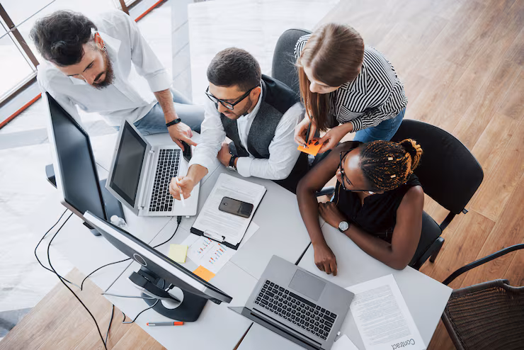 group-multinational-busy-people-working-office_146671-15658